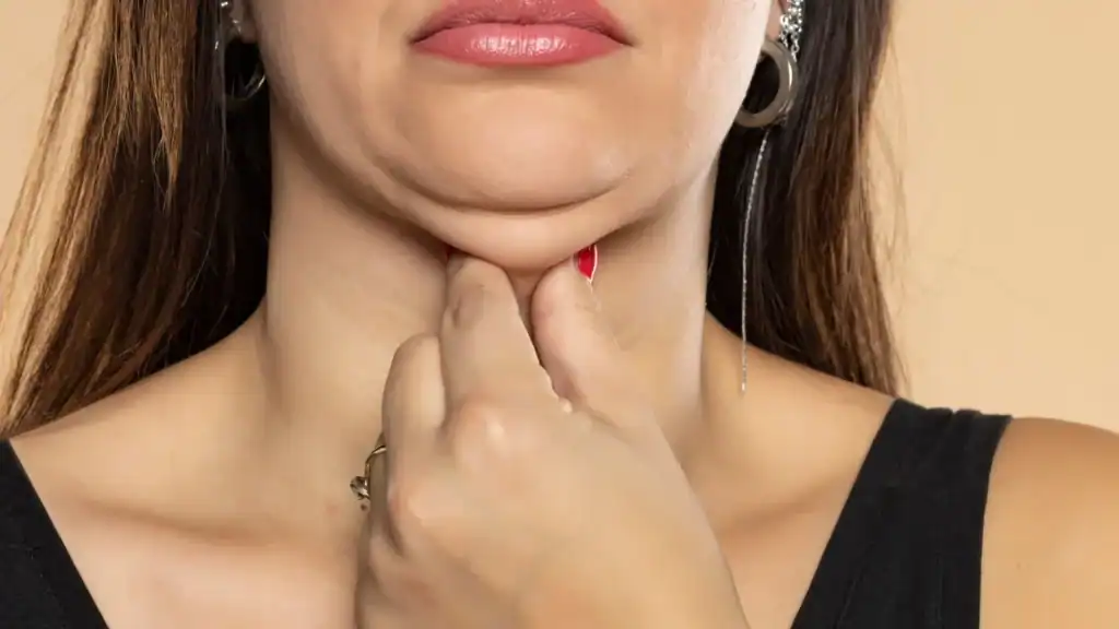 An image of a woman with double chin, sad, worried : Non Surgical Double Chin Removal Treatment in Newlands, UK